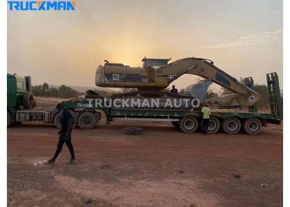 Loading and Off Loading An Excavator Work Step